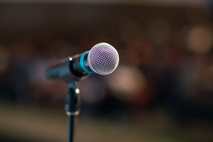 public speaking on stage microphone